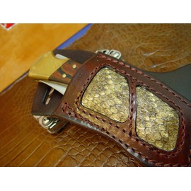 Buck 110 Rattlesnake Right-hand Cross Draw Knife Sheath. The Sheath Is Made Out of 10 Ounce Water Buffalo Leather and a Rattlesnake Insert. It is Made to Wear on Your Left-Side and Drawn with Your Right Hand the Sheath Is Dyed Dark Brown. Sheath Only the Knife Is NOT Included.
