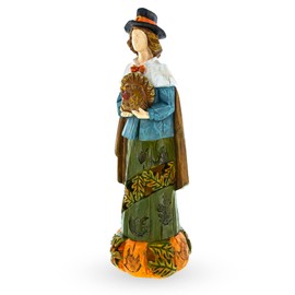 BestPysanky Thanksgiving Tradition: Pilgrim Man Holding Turkey Figurine