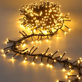 Quntis 6M 600LEDs Christmas Cluster Lights Warm White Fairy String Lights Plug in with Unique Flowing 6 Mode Waterproof for Xmas Tree Yard Outside Garden House Party Decorations