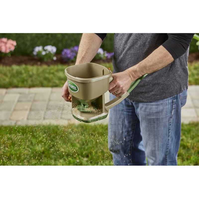 Scotts Whirl Hand-Powered Spreader for Grass Seed, Fertilizer, Salt, Ice