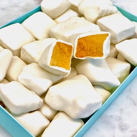 White chocolate honeycomb sponge candy. Crunchie chunks of honeycomb candy hand dipped in gourmet white chocolate (White-Chocolate)