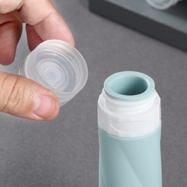 Gemice Botellas de viaje para artículos de cambiador, contenedores de tamaño de viaje aprobados por la TSA, sin BPA, a prueba de fugas, accesorios de viaje recargables líquidos con bolsa de aseo transparente (paquete de 4)