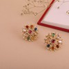 Tarinika Brass Navaratna Floral Stud Earrings - Indian Earrings for