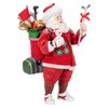 Kurt S. Adler 10.5-Inch Fabriché Golf Santa Table Piece