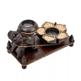 AeraVida Adorable Elephant Pulling a Lotus Flower Carved Rain Tree Wood Candle Holder
