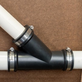 Fernco 1.5 in. Hub Flexible PVC Wye DWV Pipe Fitting Connector for Cast Iron, Steel and Plastic Connections in Black