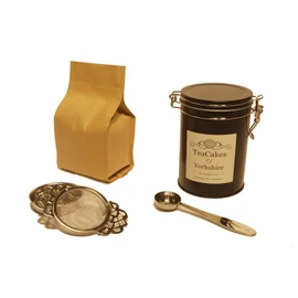 Golden Pu-erh Tea Gift Set Loose Leaf Tea 5yr Aged Mellow pu erh Wrapped 100g in Caddy with Tea Strainer and Measuring Spoon by TeaCakes of Yorkshire.