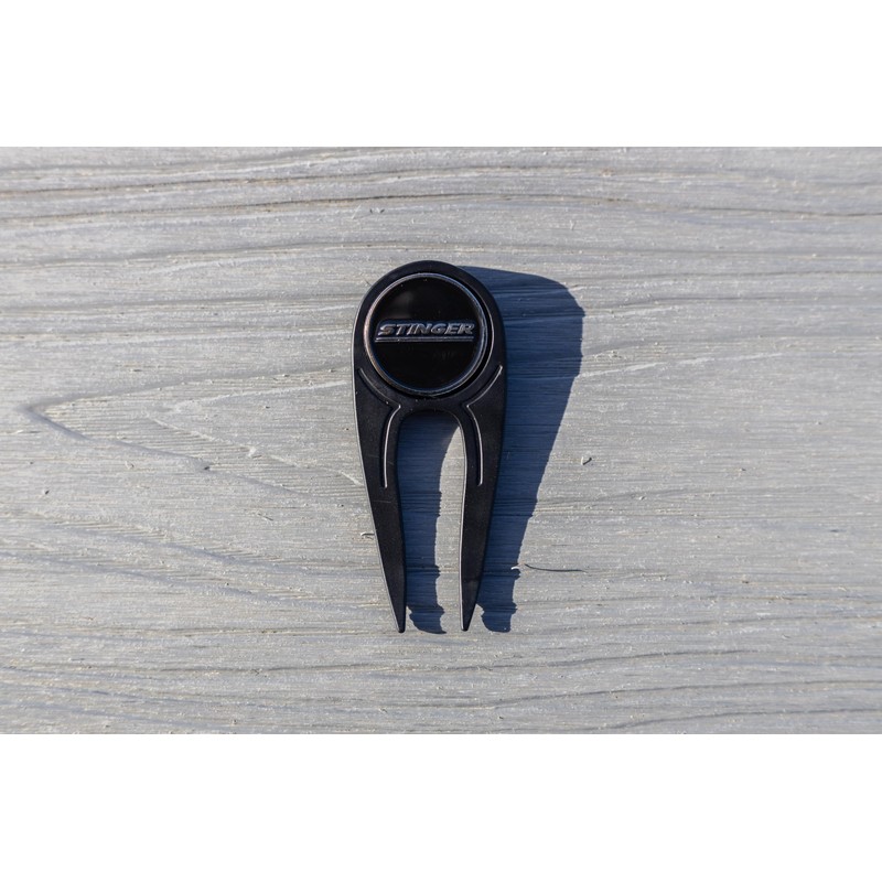 Stinger Golf Products' Sleek Black Golf Divot Tool with Bottle