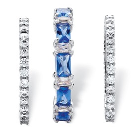 Palm Beach Jewelry Juego de 3 anillos de eternidad chapados en platino con zafiro azul simulado y circonita cúbica baguette apilables azul