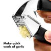 OXO Good Grips - Prensa de ajo de acero inoxidable