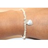 Silver Colour Round Beads With Heart Charm Stretchable Bracelet