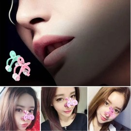 Self-beauty facial portable nose bridge stimulation forceps massager pink / 셀프 미용 얼굴형 휴대용 코 콧대 자극 집게 마사지기 핑크