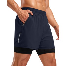 Pudolla - Pantalones cortos de correr para hombre de 7 pulgadas con bolsillos con cierre, secado rápido, 2 en 1, para entrenamiento de tenis, yoga, marino, Large