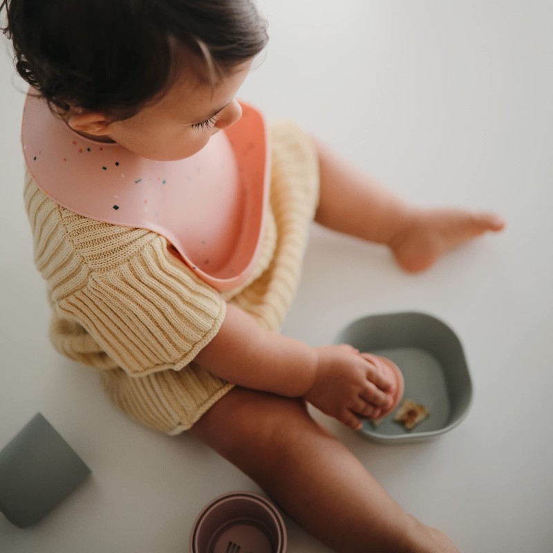 mushie Silicone Baby Bib | Adjustable Fit Waterproof Bibs (Powder