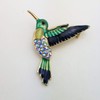 HAISWET - Broche esmaltado con diseño de colibrí con diamantes