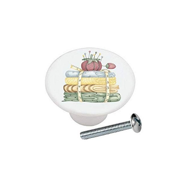 Stack of Material Fabric Fat Quarter Tape Measure and Pincushion