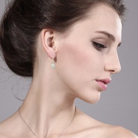 Gem Stone King 14K Yellow Gold White Opal and White Topaz Hook French Fish Ear Wire Dangle Earrings For Women (1.54 Cttw, Gemstone October Birthstone, Oval Cabochon 7X5MM, Round 3MM)