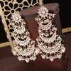 Aheli Gold Plated Long Chandbali Copper White Dangle Earrings Glided