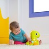Bright Starts 12506 Go, Go Dino Toy with Music and