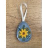 Handmade felt Easter decoration Easter egg with yellow flower