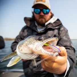 Northland Fishing Tackle Pitchin' Puppet Darting Premium Fishing Jig for Snap Jigging & Pitching Walleyes, 5/16 Oz, Purple Wonder