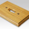 Amerelle Traditional Double Toggle Wood Wallplate in Light Oak