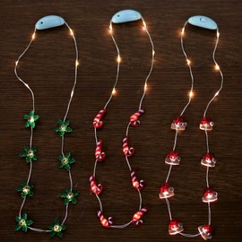 JASHIKA Christmas Party Favors, Light Up Glowing Necklace Candy Cane, Christmas Hat,Red Berry Stem Set of 3 with Multi Flashing Options for Holiday Decoration