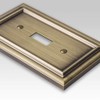 Amerelle Continental Quadruple Rocker Cast Metal Wallplate in Brushed Brass