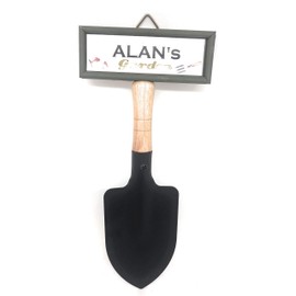"Welcome to Alan's garden" hanging shovel sign