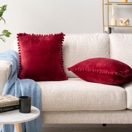PAVILIA Burgundy Red Throw Pillow Covers with Pom Pom 20x20 Set of 2, Decorative Pillow Cases for Bedroom Aesthetic, Small Throw Pillows Set for Bed, Velvet Euro Plush Cushion Covers for Sofa Couch