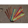 Beachsticks Rainbow wood sticks which hold your beach towel tightly