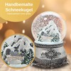 Snow globe mountain landscape with bridge, pewter effect ornaments, with