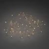 Konstsmide LED Tropfenlichterkette, 50 bernsteinfarbene Dioden, 3V Innentrafo, kupferfarbener Draht