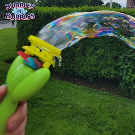 Bubbles in Bubbles Electronic Blower with 3.5 Ounces of Bubble Bonanza Solution. Makes Giant Bubbles with Little Bubbles Inside. (Green)