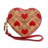 Coach COACH HEART COIN CASE WRISTLET IN SIGNATURE CANVAS WITH