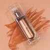 Iluminador Huda Beauty Over Body Highlighter N.y.m.p.h. Líquido Tono Aurora