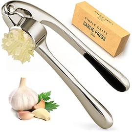 Simple Craft Garlic Press - Rustproof & Ergonomic Garlic Mincer That Is Easy To Squeeze - Heavy Duty Garlic Crusher For Extracting Garlic Paste, Nuts, Ginger, Seeds and More (Silver)