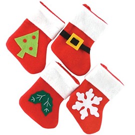 Set Of Four Baby Mini Christmas Stockings by Christmas Decorations
