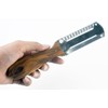 3-in-1 Kitchen Peeler, Scrabber & Grater: a cutting tool with
