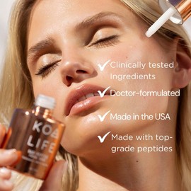 KOA Life NAD Peptide Facial Daily Anti-Aging Serum. in a Metallic Copper Glass Dropper Bottle and Metallic Copper Outer Cylinder Carton