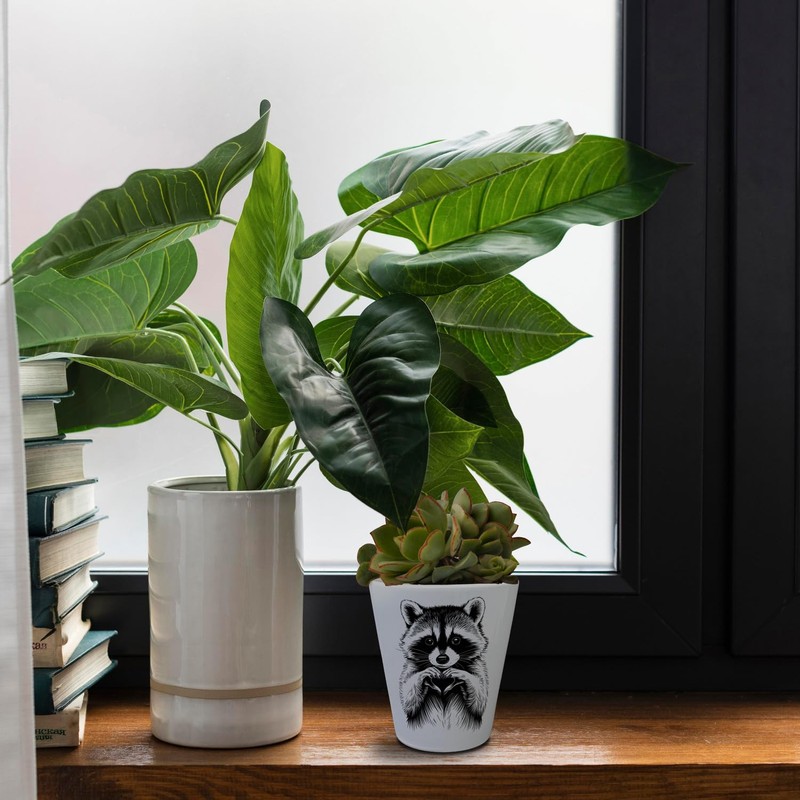 Raccoon showing heart flower pot for animal lovers, cute plant