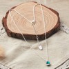 Philip Jones May (Emerald) Birthstone Necklace Created with Zircondia® Crystals