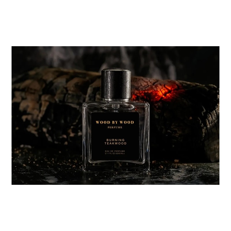 A burning bonfire, the scent of wet firewood.Burning Teakwood /