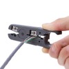 Multi-functional tool with round cable stripper, cable cutter, flat cable