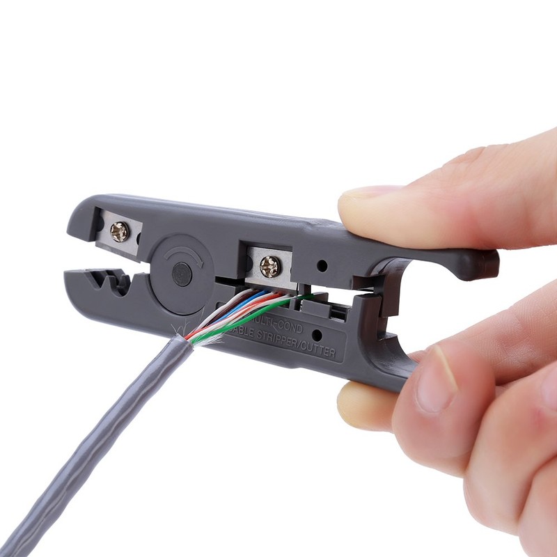 Multi-functional tool with round cable stripper, cable cutter, flat cable