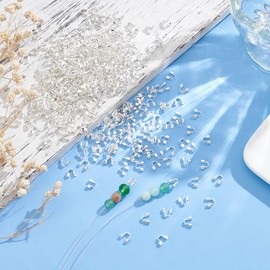 UNICRAFTALE 600Pcs 5x6x2mm Silver U Shape Guards Wire Protector Cable Protectors Brass Wire Guardians Thread Protector Loop Guardian Hole 1.5mm for Necklaces Bracelets Jewelry Craft Making