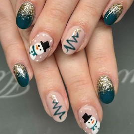 Christmas Press on Nails Short Oval French Tip Fake Nails Nude & Green False Nails with Cute Snowman Designs Gold Glitter Glossy Glue on Nails Xmas Acrylic Nails for Women Girls 24 Pcs