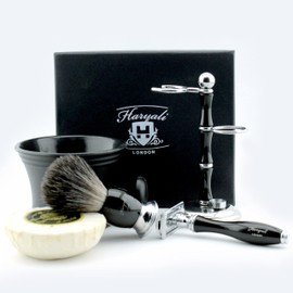 Pure black badger hair shaving set in black. The includes shaving brush, De safety (blades not included), shaving brush and holder, cup with soap. This is a perfect gift for