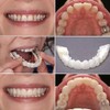 Dientes postizos blancos