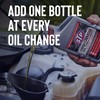 STP High Mileage Oil Treatment + Stop Leak Engine Oil